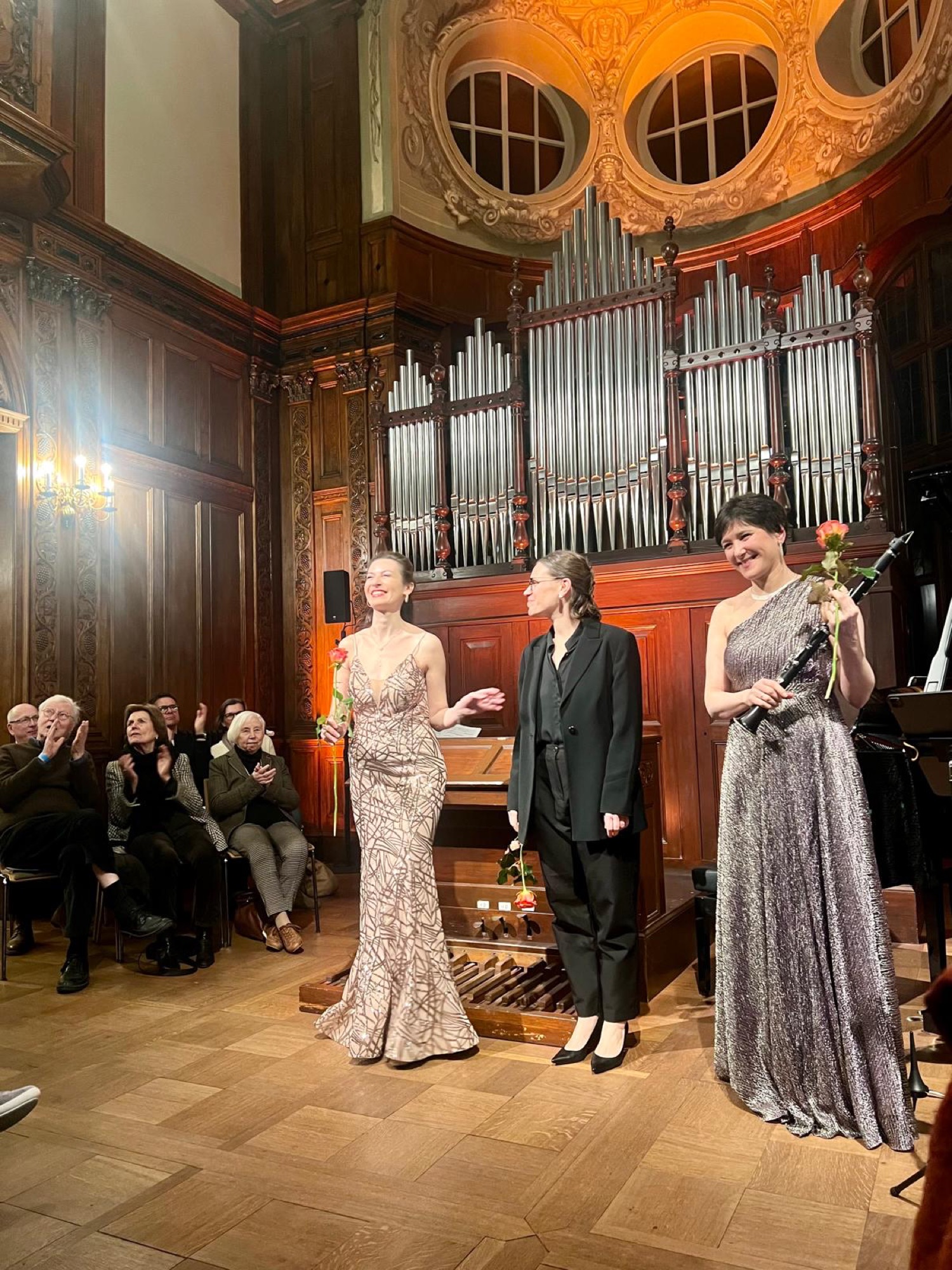 Taking a bow with fellow musicians after a concert